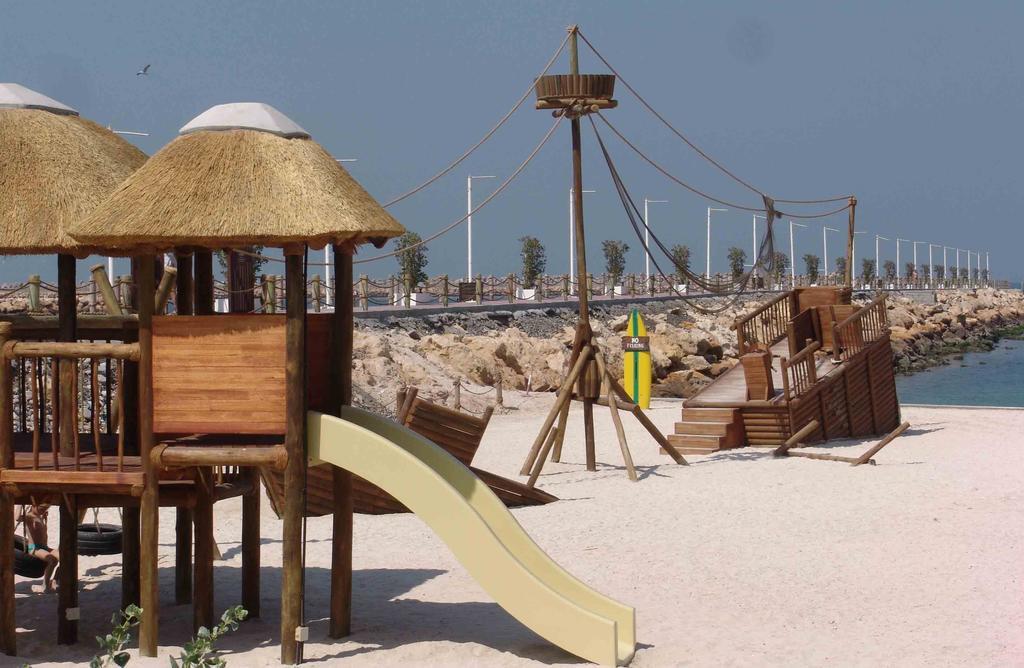 Radisson Blu Resort, Schardscha Exterior foto The beach at Al Reef Village