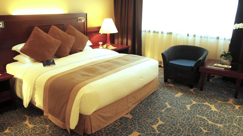 Radisson Blu Resort, Schardscha Exterior foto A room at the hotel