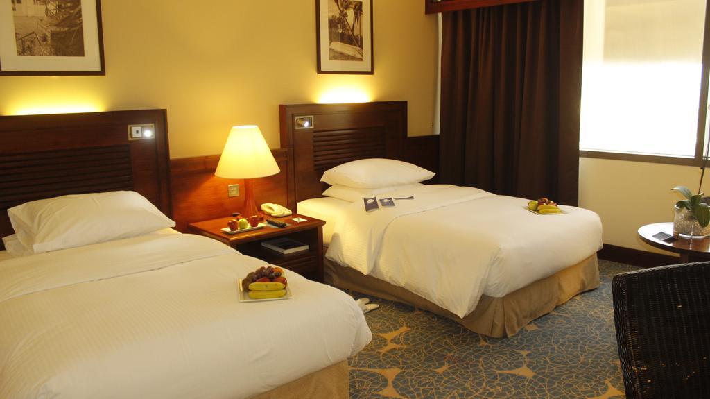 Radisson Blu Resort, Schardscha Exterior foto A room at the hotel