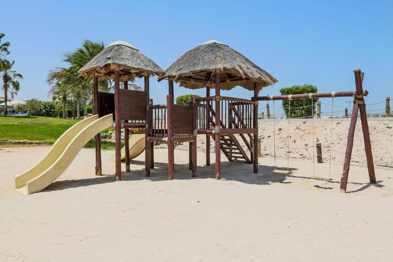 Radisson Blu Resort, Schardscha Exterior foto Playground at the park